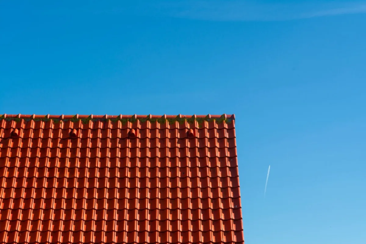 Tile roof gable in full sun, the kind of exposure that sets roof life in West Allis, WI